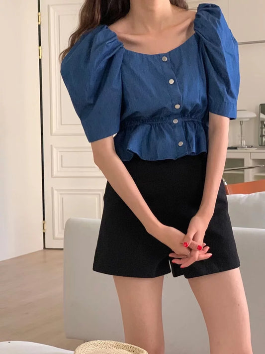 Peplum navy top